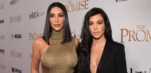 Odds on Kim and Kourtney Kardashian Fight as Two 'Go at it'