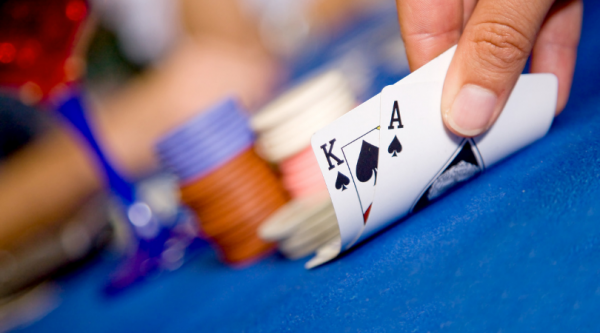 what does surrendering mean in blackjack