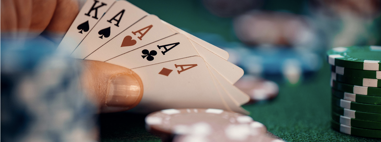 Casino cards and chips on game table