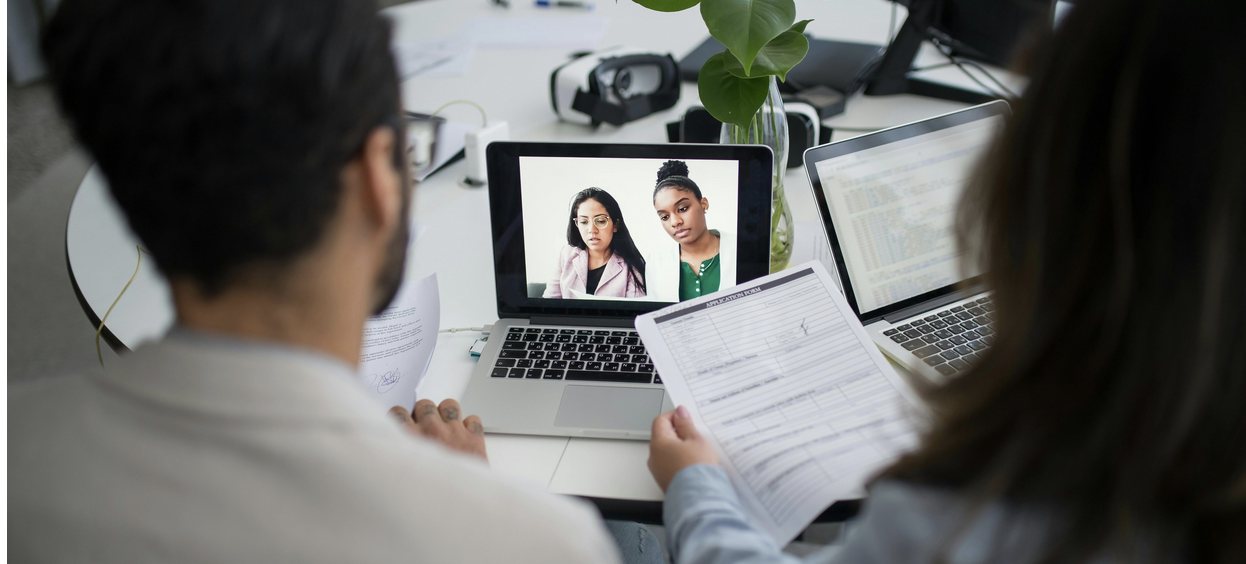 Man and woman on a laptop