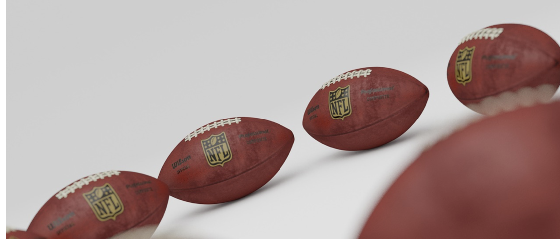 Footballs lined up