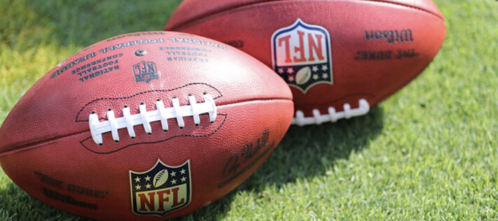 Footballs on field