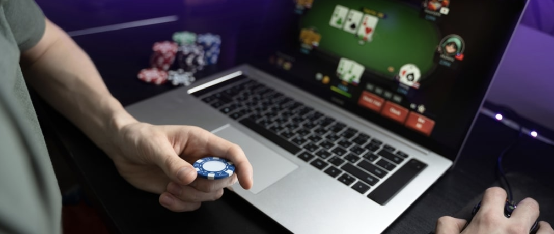 laptop with casino chips