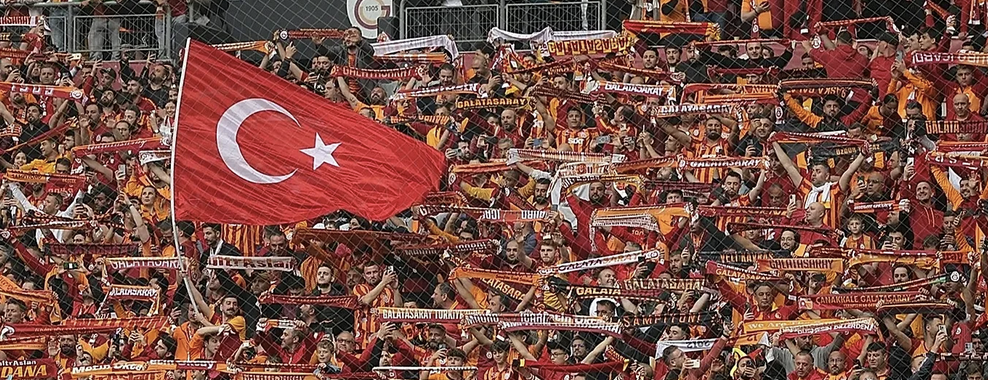 Turkey football game with national flag waving