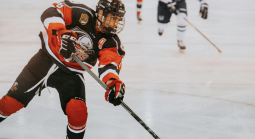 Hockey player from Finland on ice