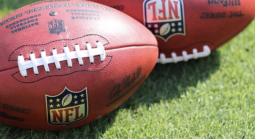 NFL footballs on field 