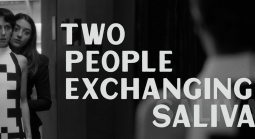 Two People Exchanging Saliva 