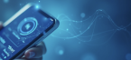 Phone being held in blue backdrop